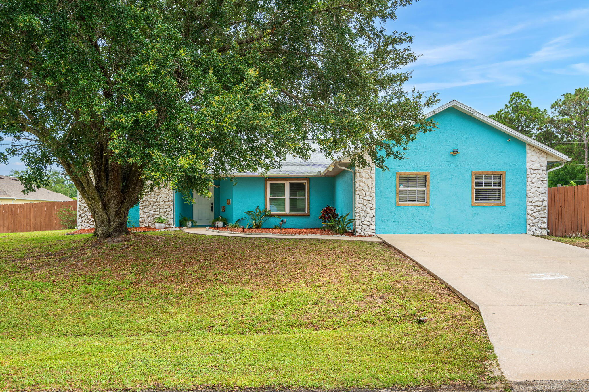 a house with trees in front of it