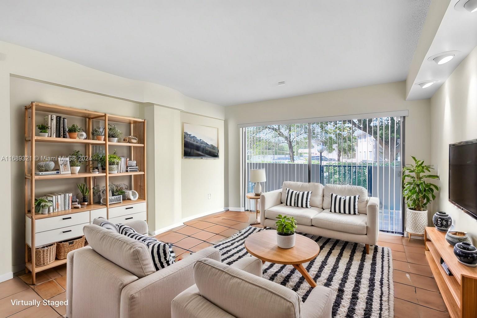 Living Area with access to balcony - Virtually Staged Furniture