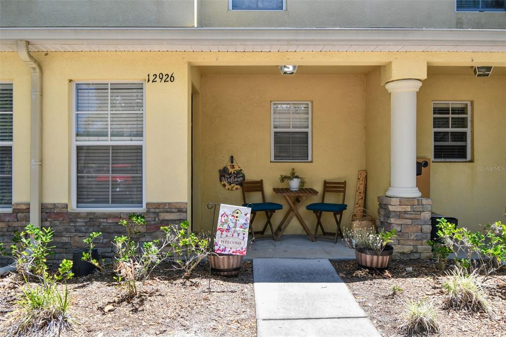 a building outdoor space with patio furniture