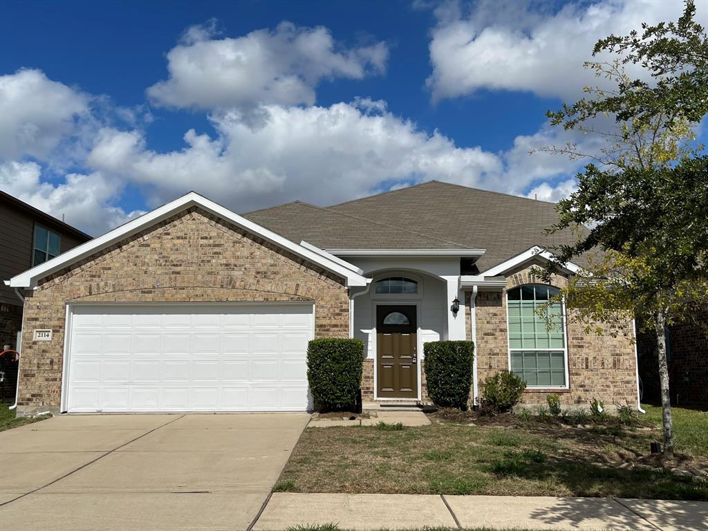 a view of a house with a garage