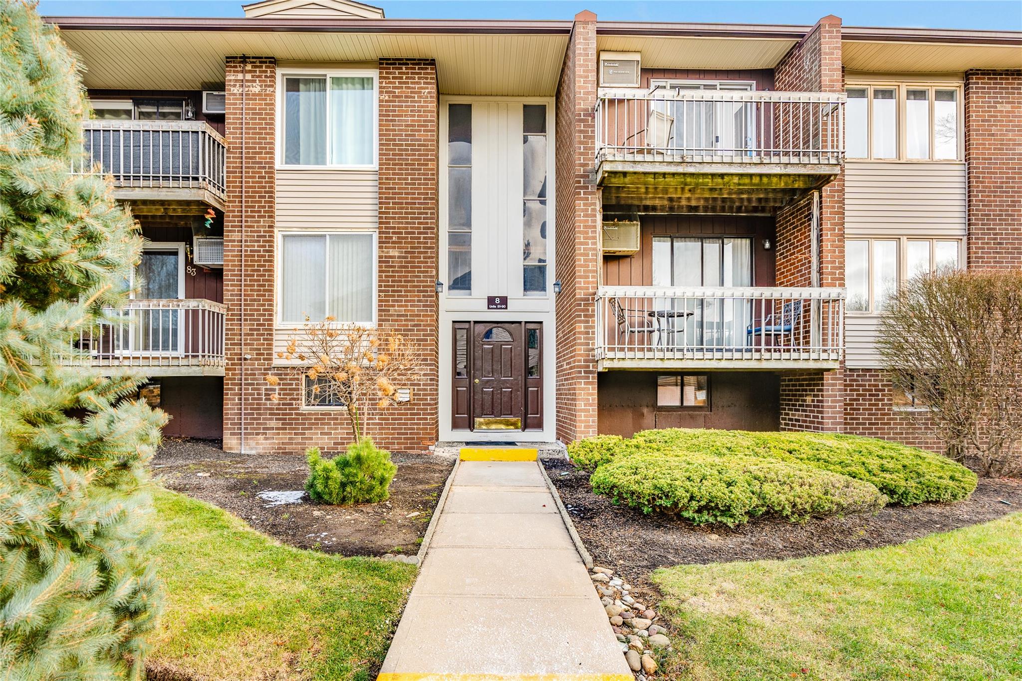 a front view of a multi story residential apartment building