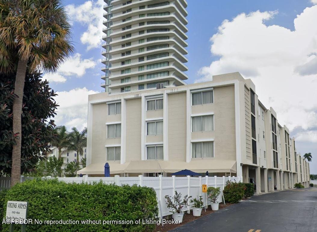 a front view of a building with balcony