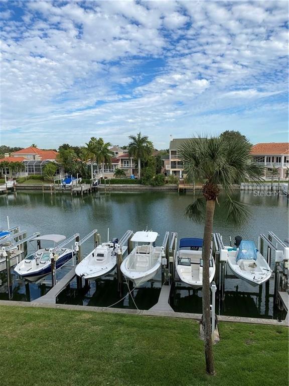 a view of a lake with houses in outdoor space