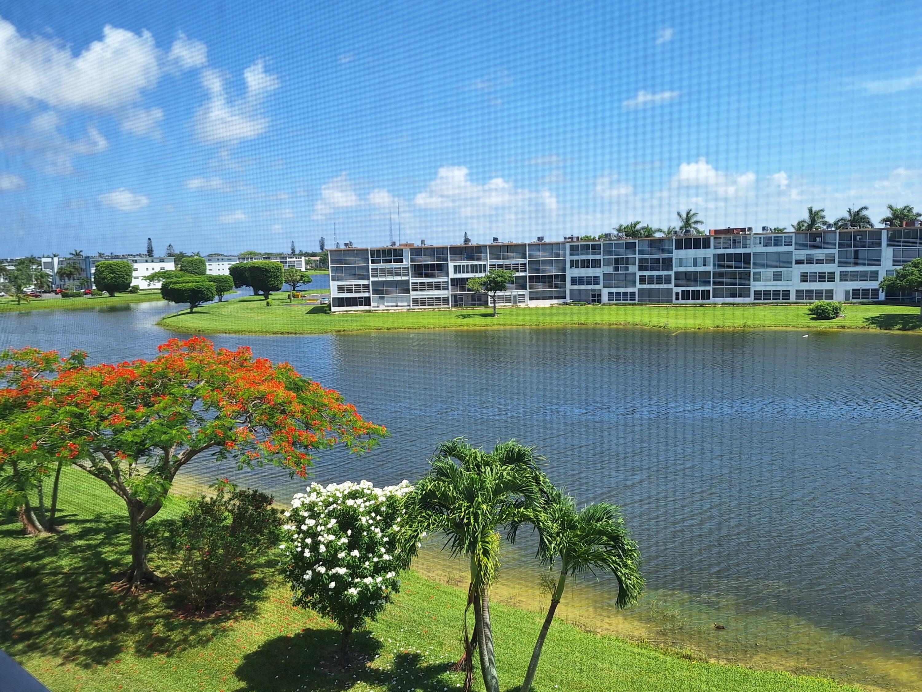 a view of a lake with outdoor space