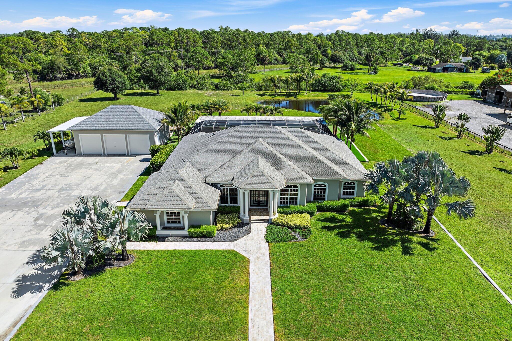 a aerial view of a house with garden