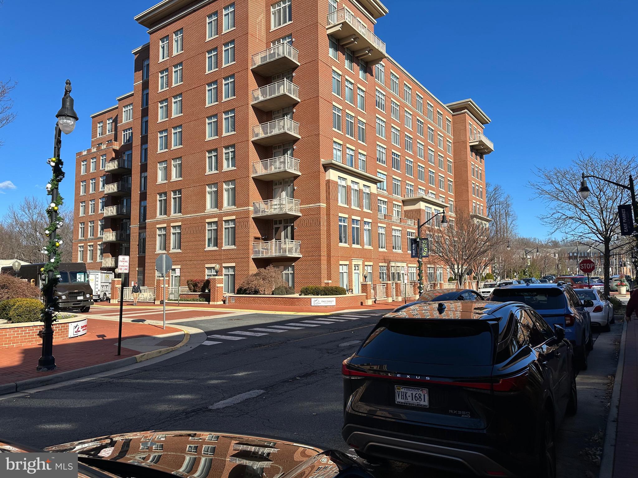 a city street lined with buildings and cars