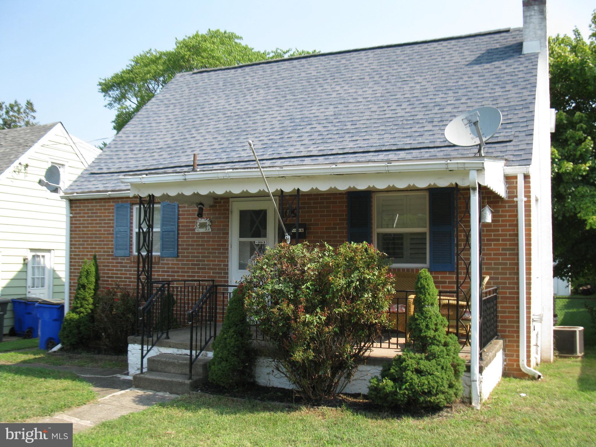 front view of house with a yard