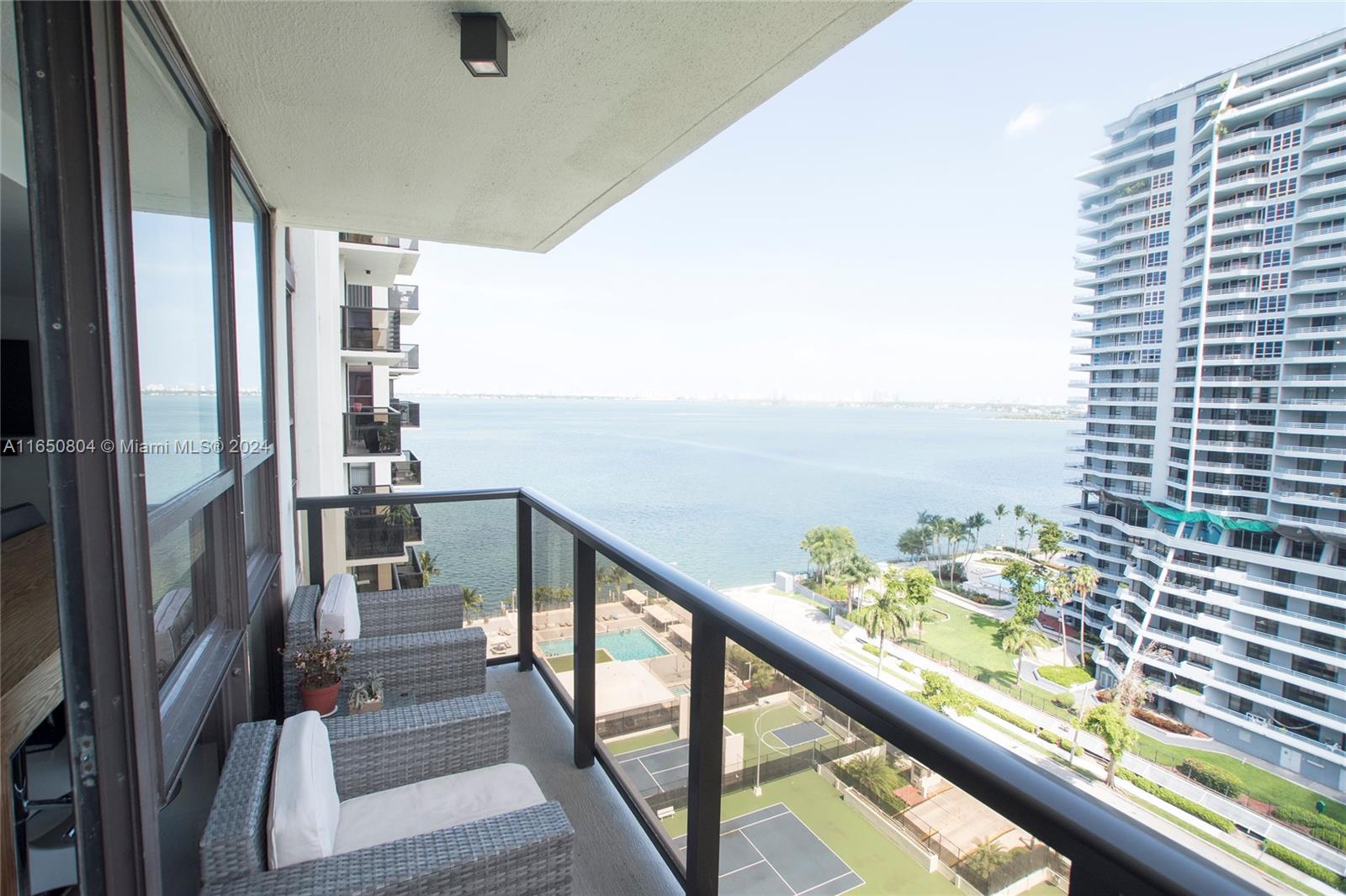 a view of balcony with furniture