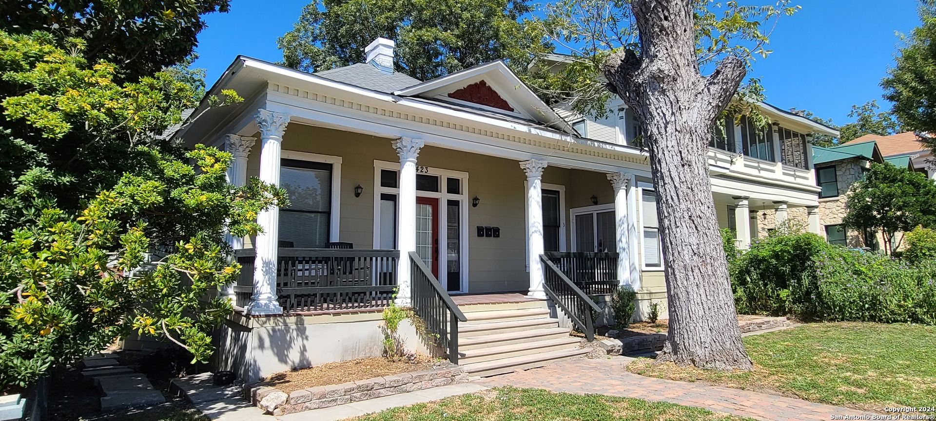 a front view of a house with a porch