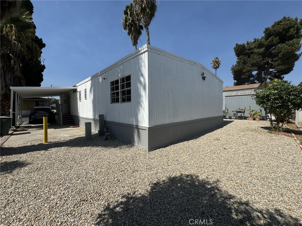 a view of a backyard of the house