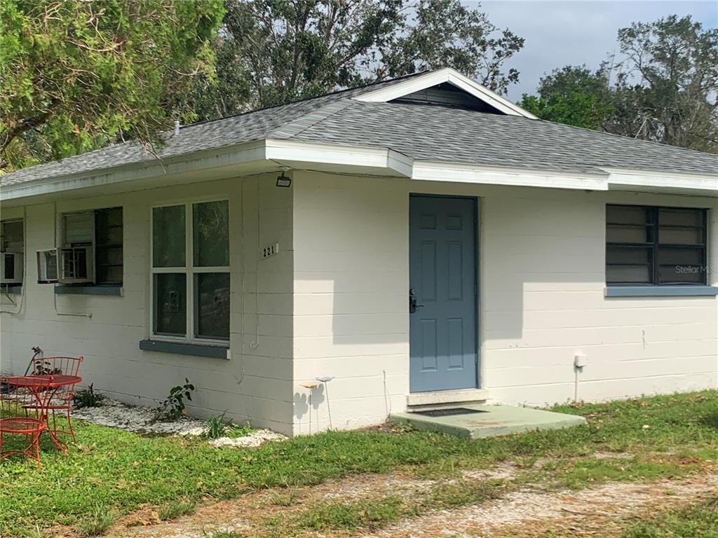 a house with yard in front of it