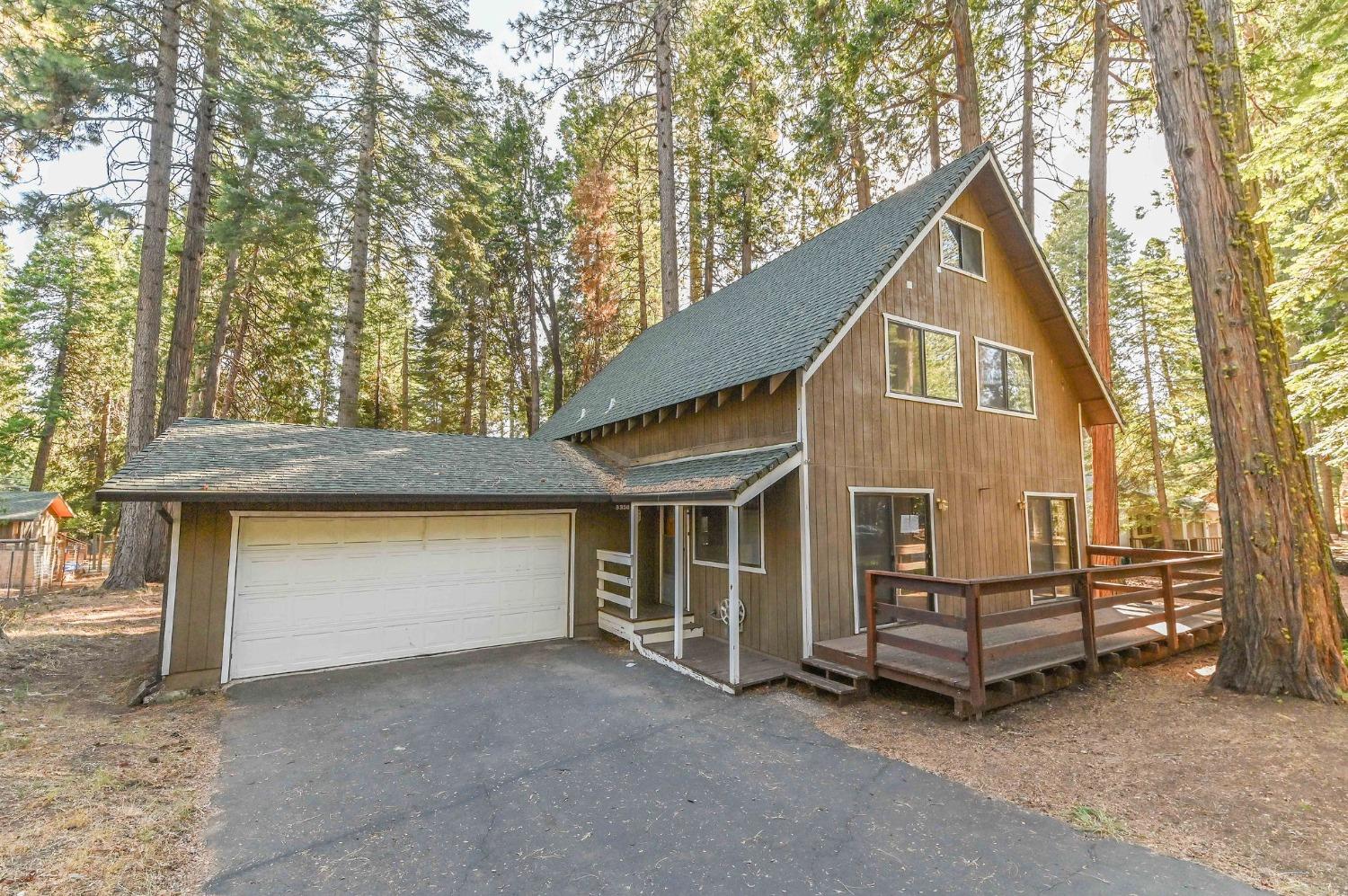 a view of a house with a garage