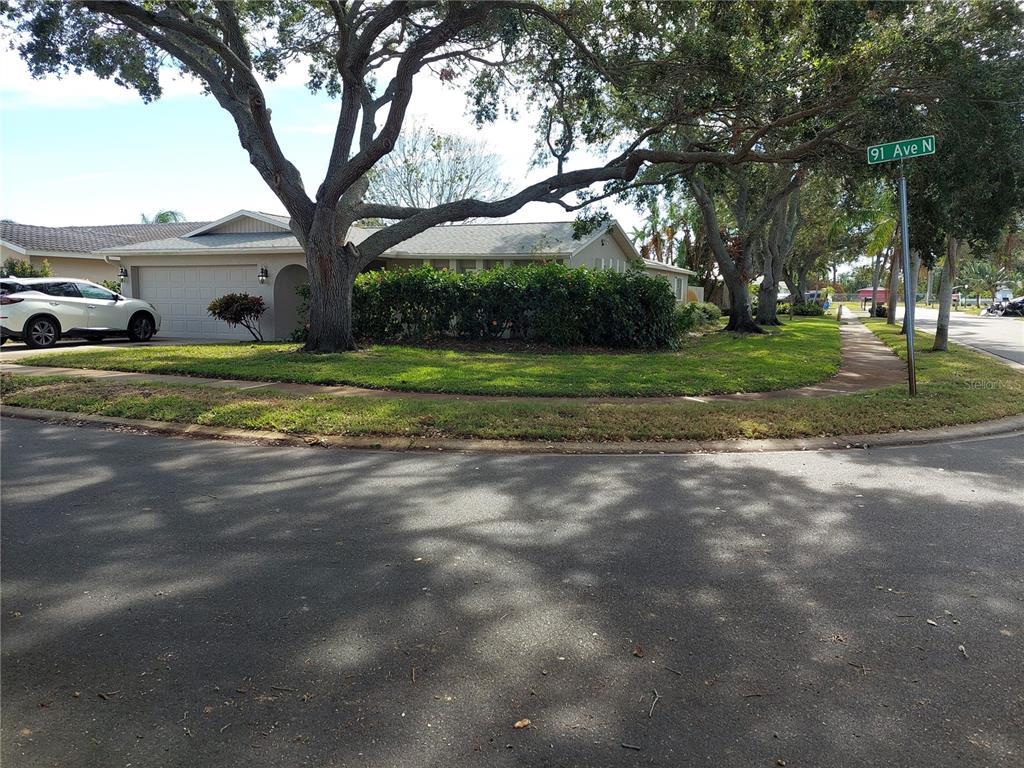 a view of a house with a big yard