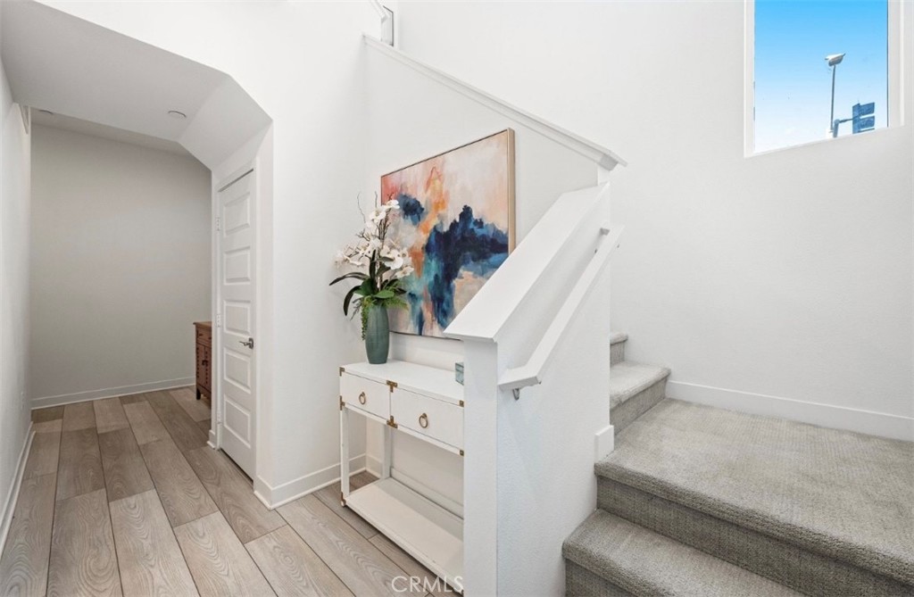 a view of entryway with wooden floor