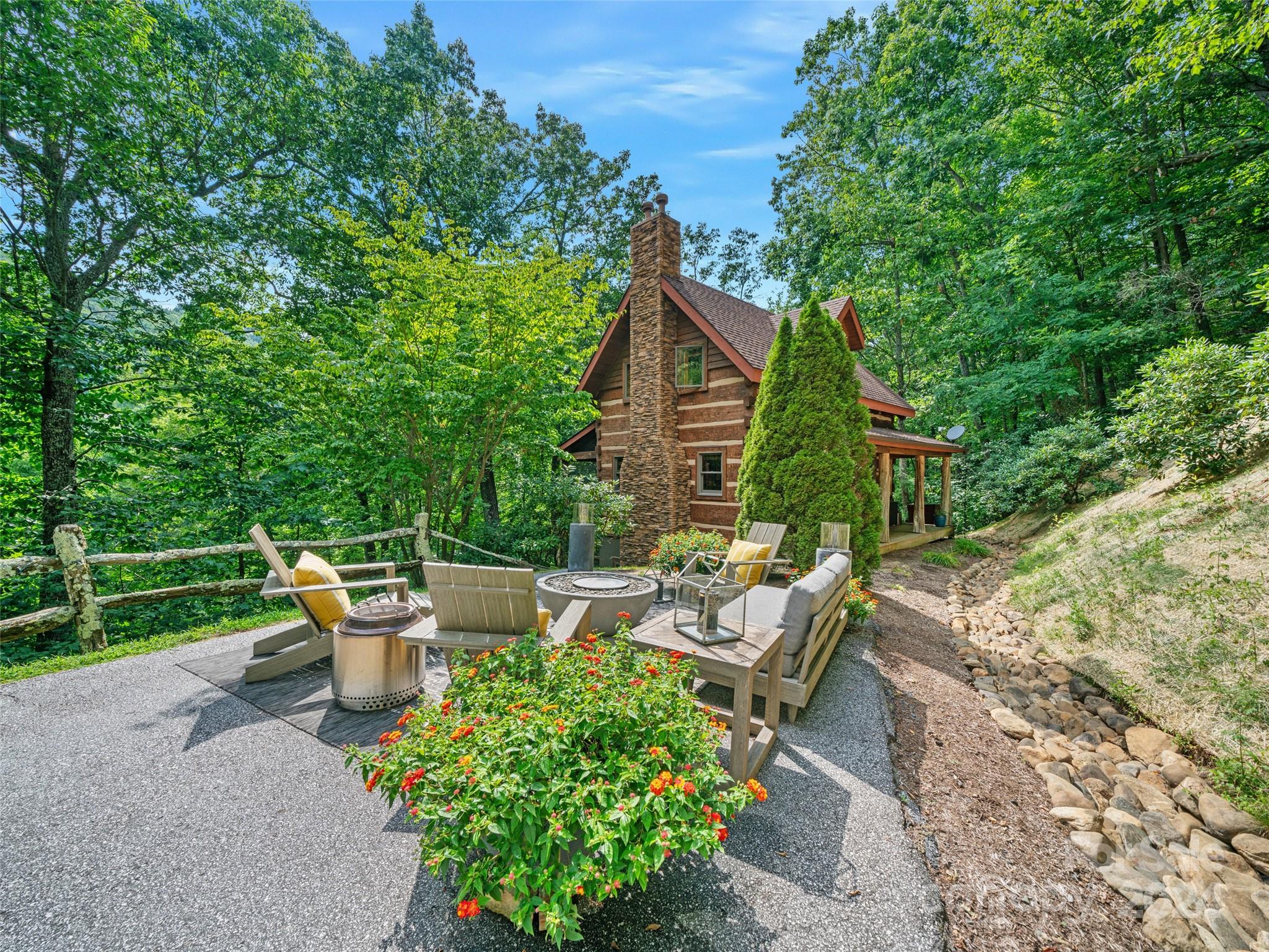 a view of backyard with seating space and garden