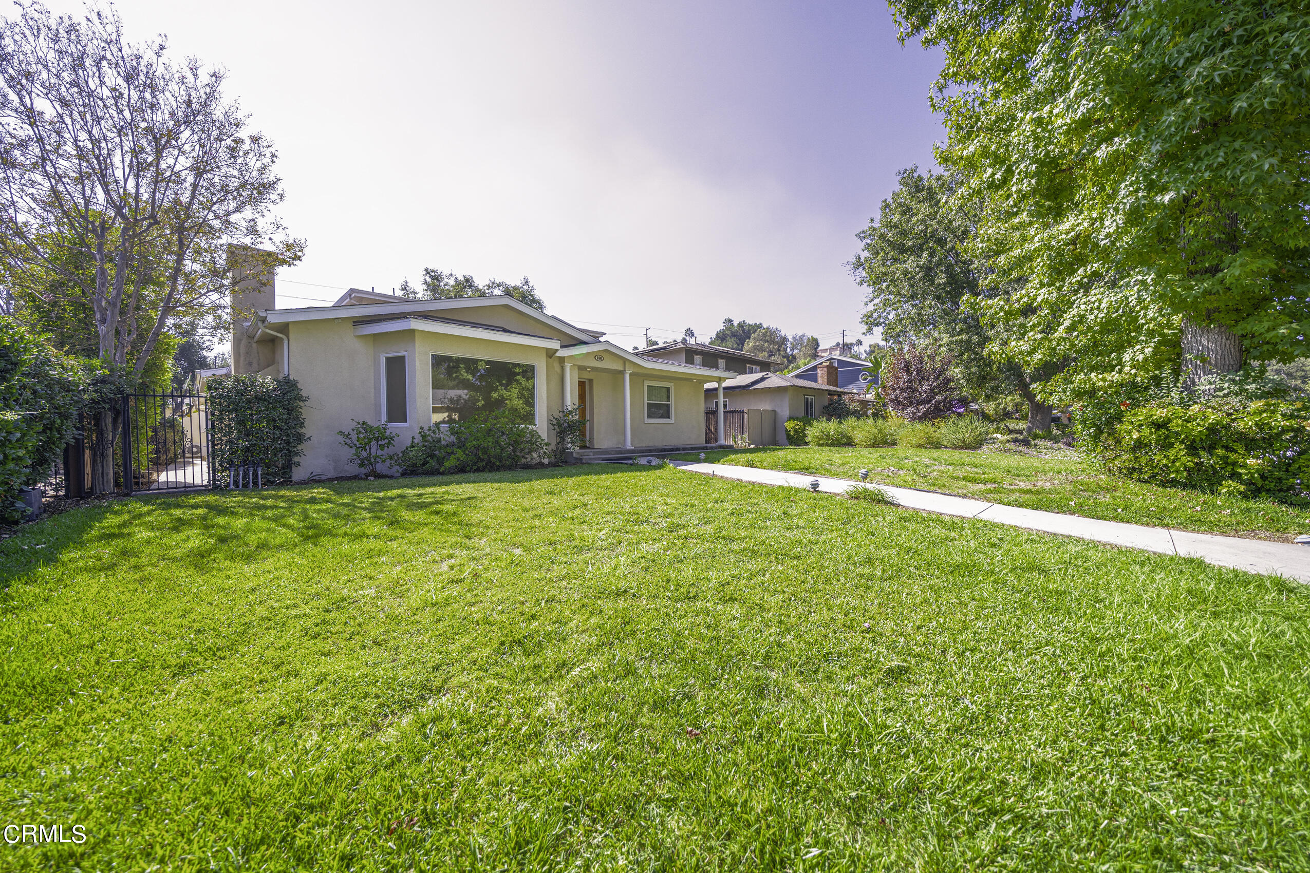 a view of a house with a big yard