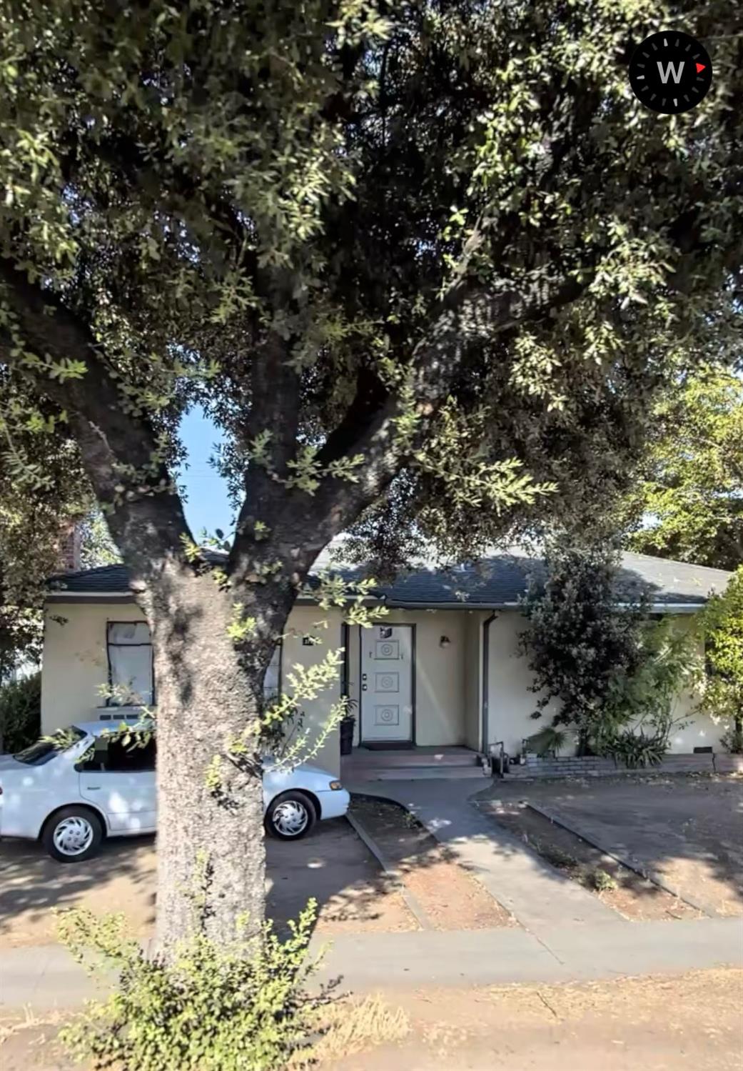 a view of a house with a patio