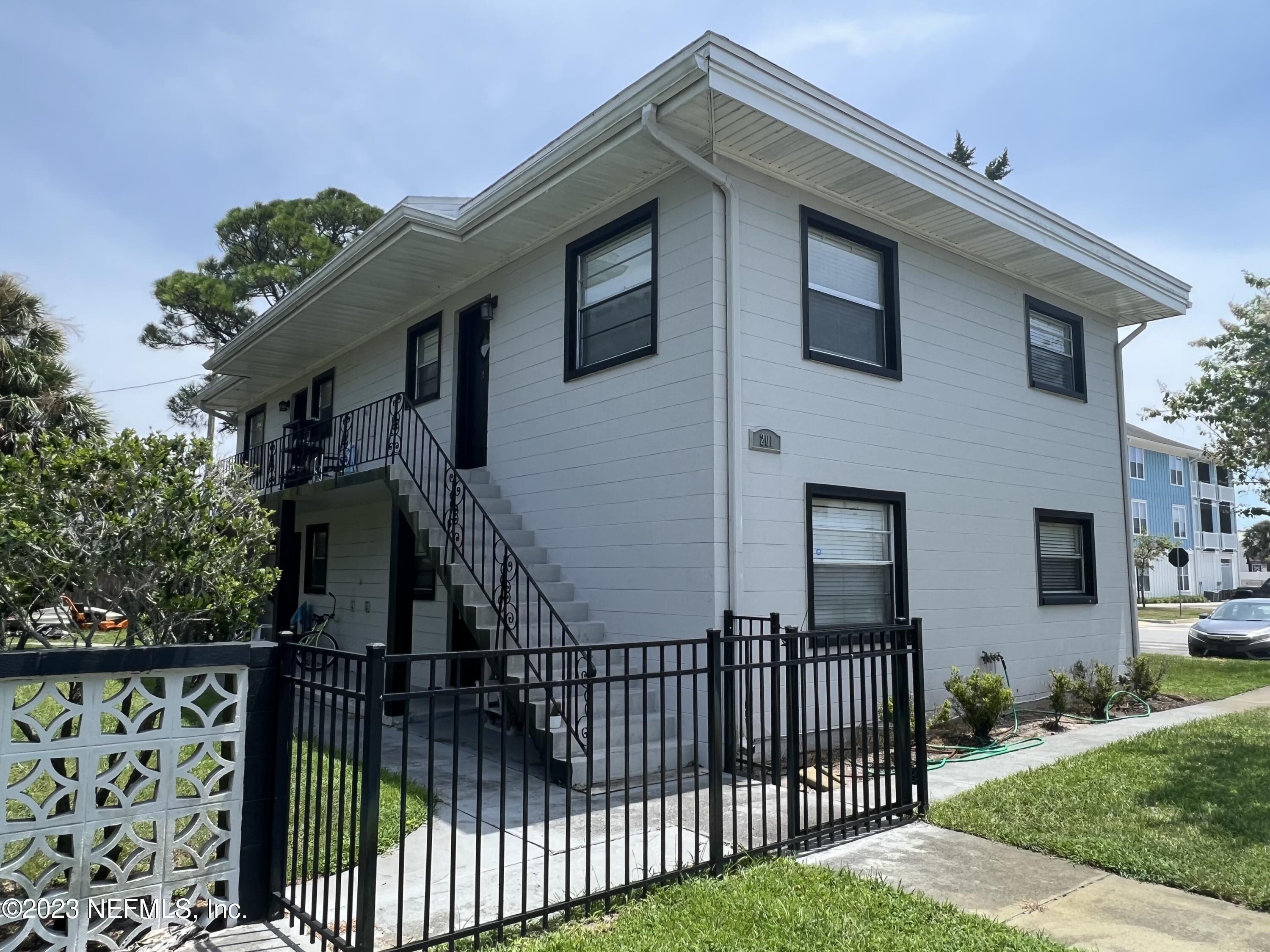 a front view of house yard with green space