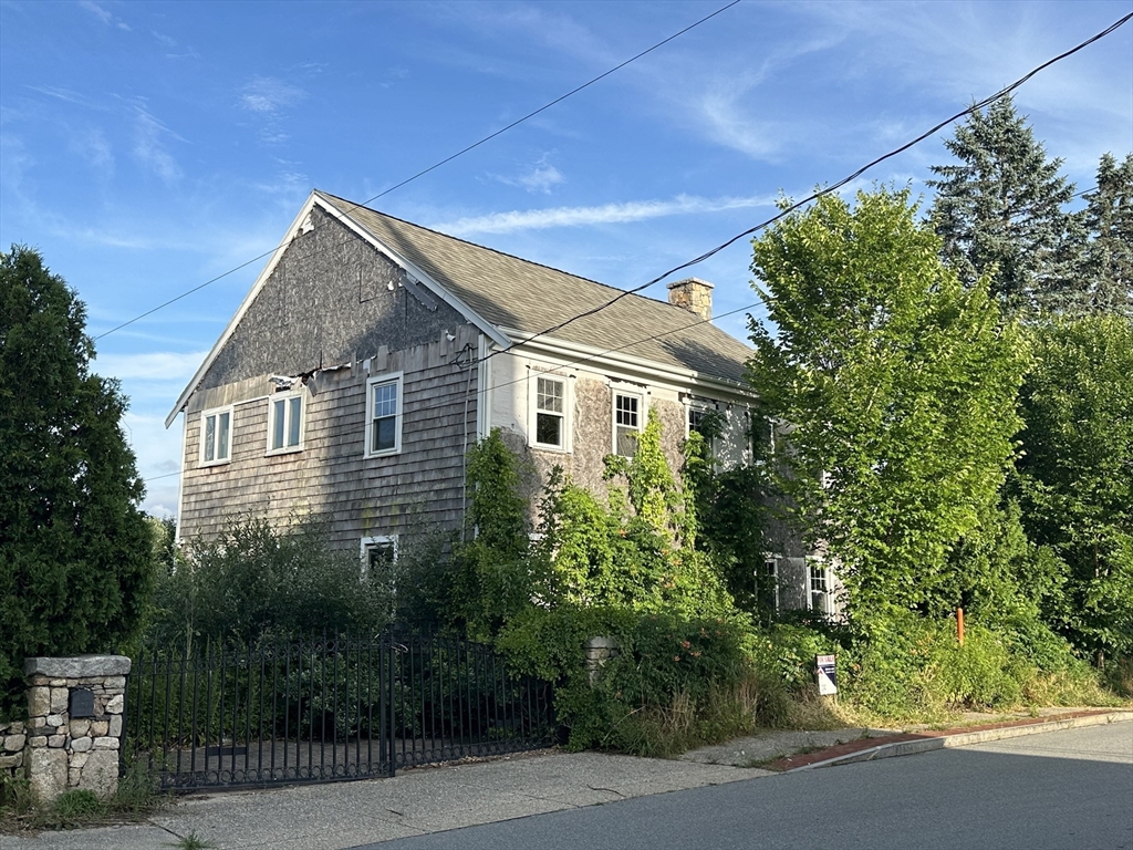 a house view with a garden space