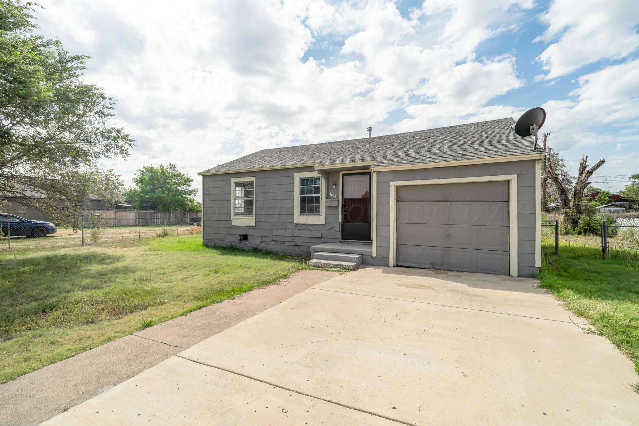 front view of house with a yard