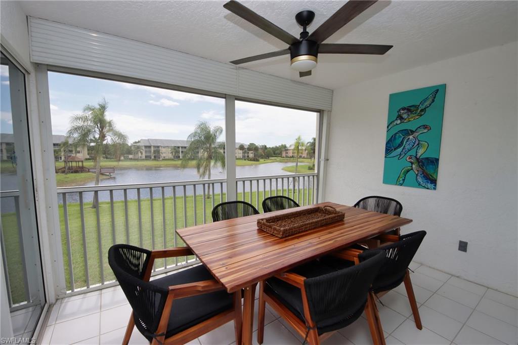 a view of a dining room with furniture window and outside view