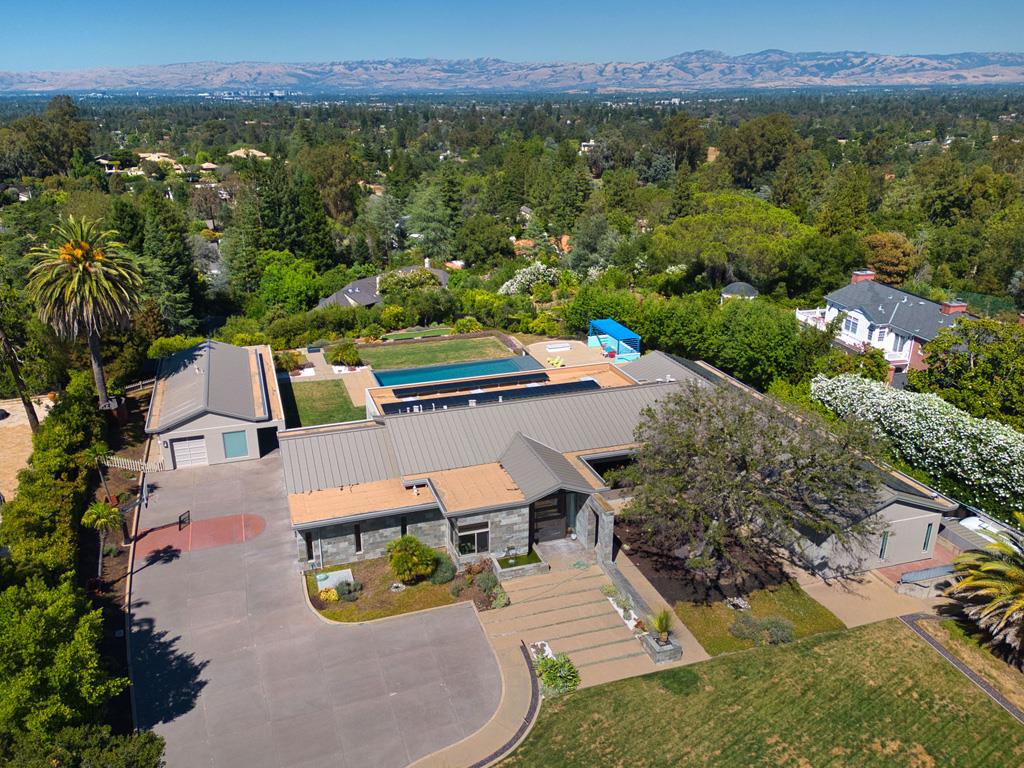 an aerial view of house with yard