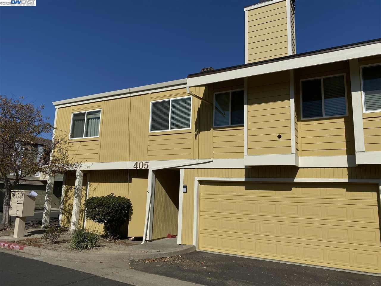 a view of a house with a garage