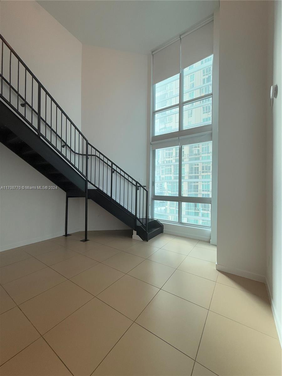 a view of an entryway with a window