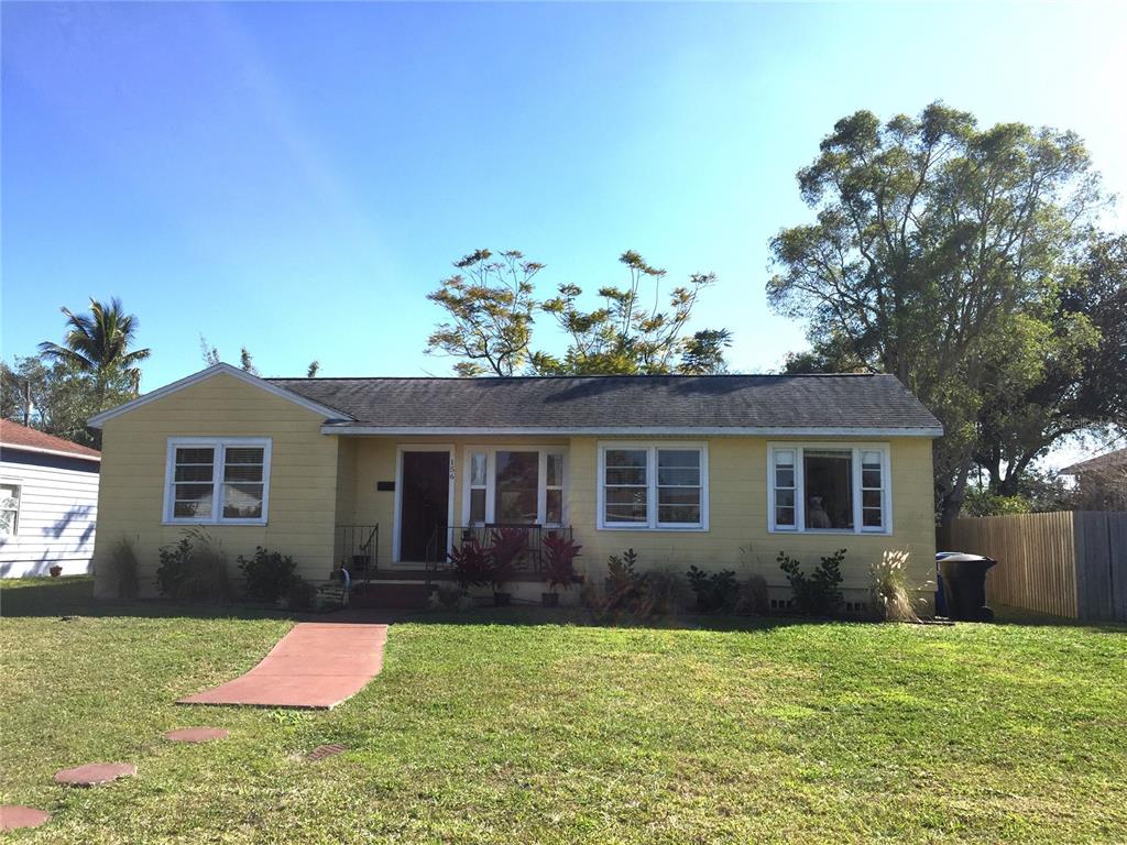 front view of a house with a yard