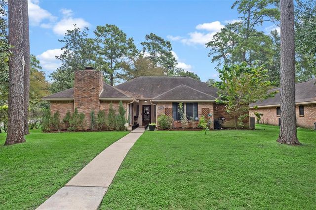 Homes for Sale with a Garage in River Plantation, Conroe, TX | Compass