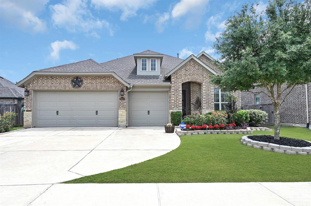 a house view with a garden space