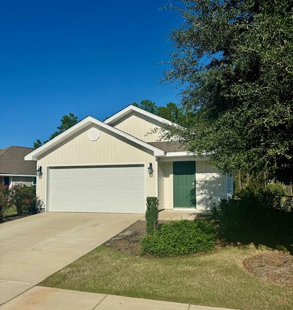 front view of a house and a yard