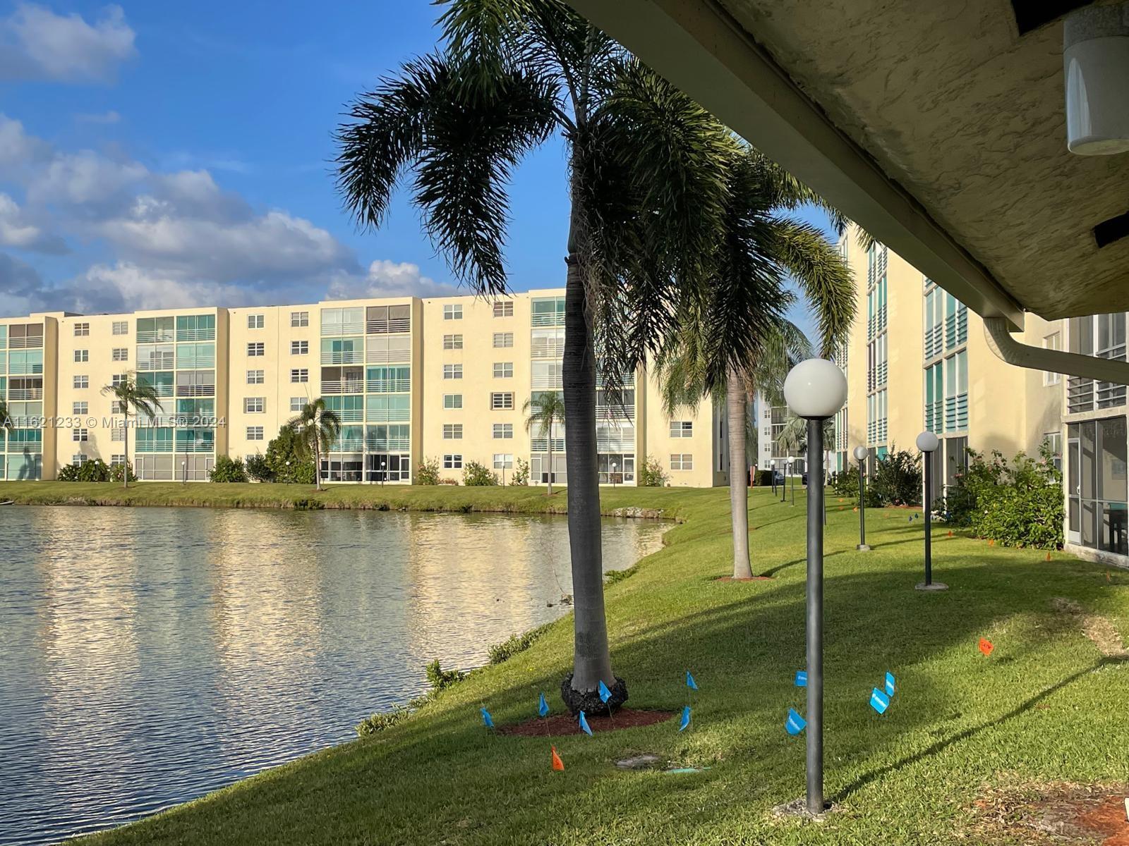 a view of a lake with a big yard