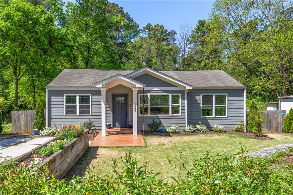 front view of a house with a yard