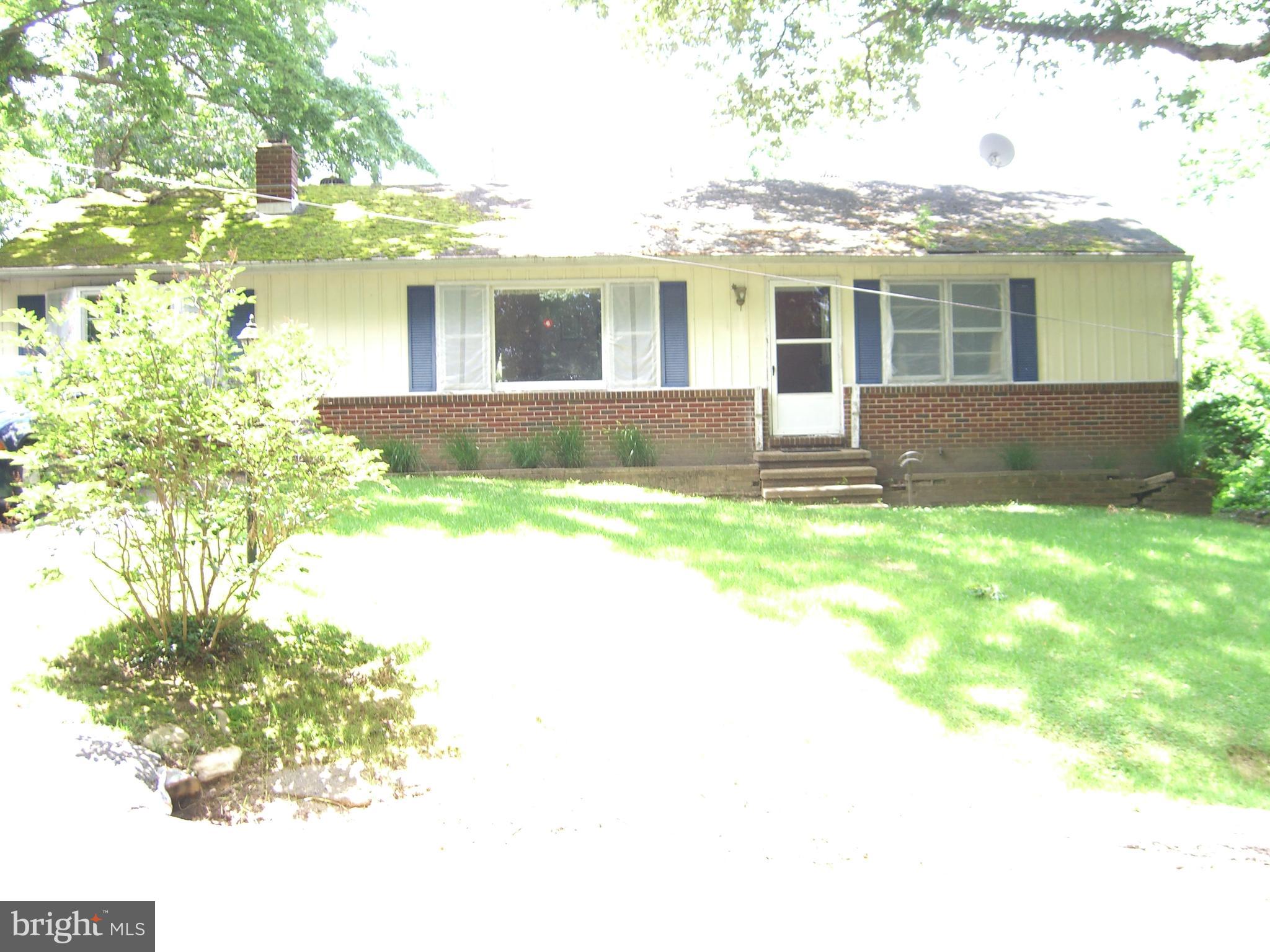 a front view of house with yard