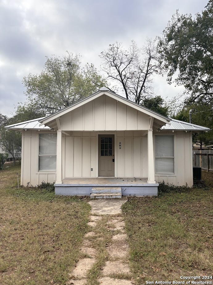 a front view of a house with yard