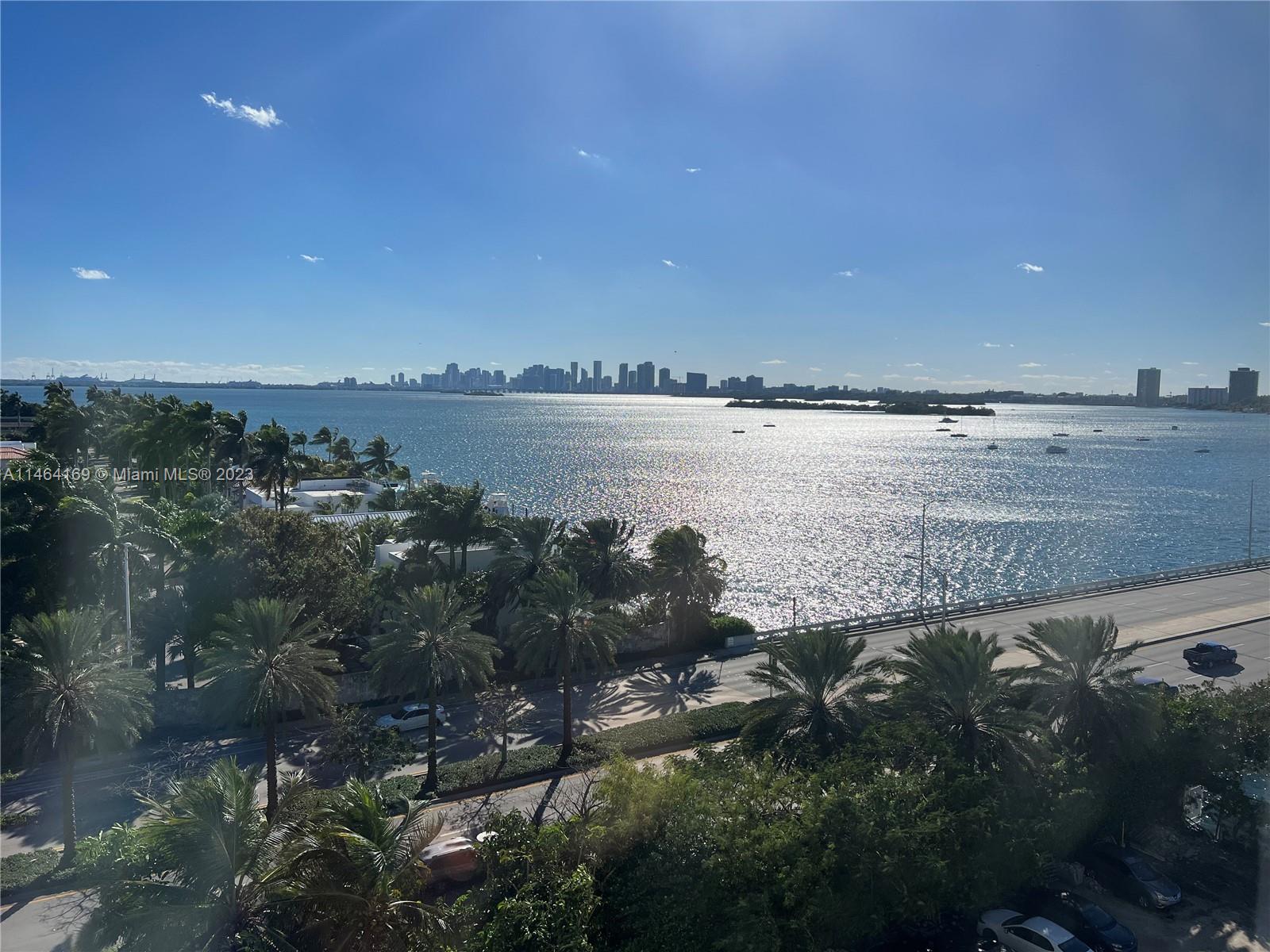 a view of a lake with a city