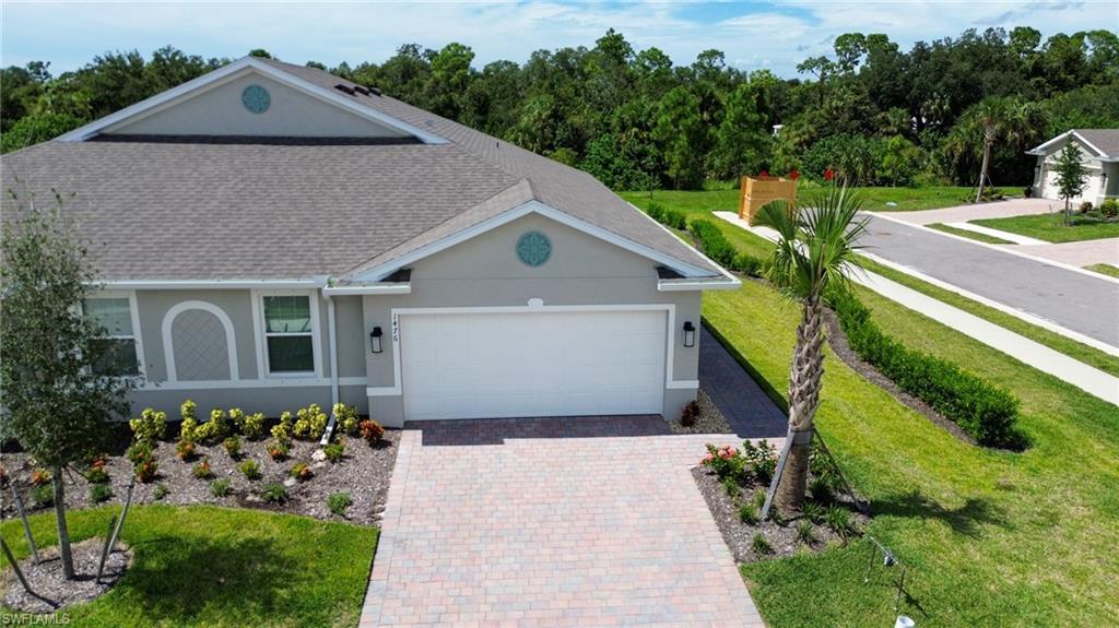 View of front of property with garage