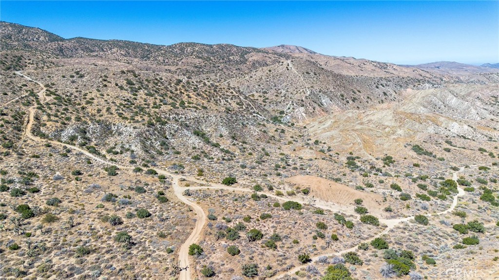 a view of a large mountains in the background