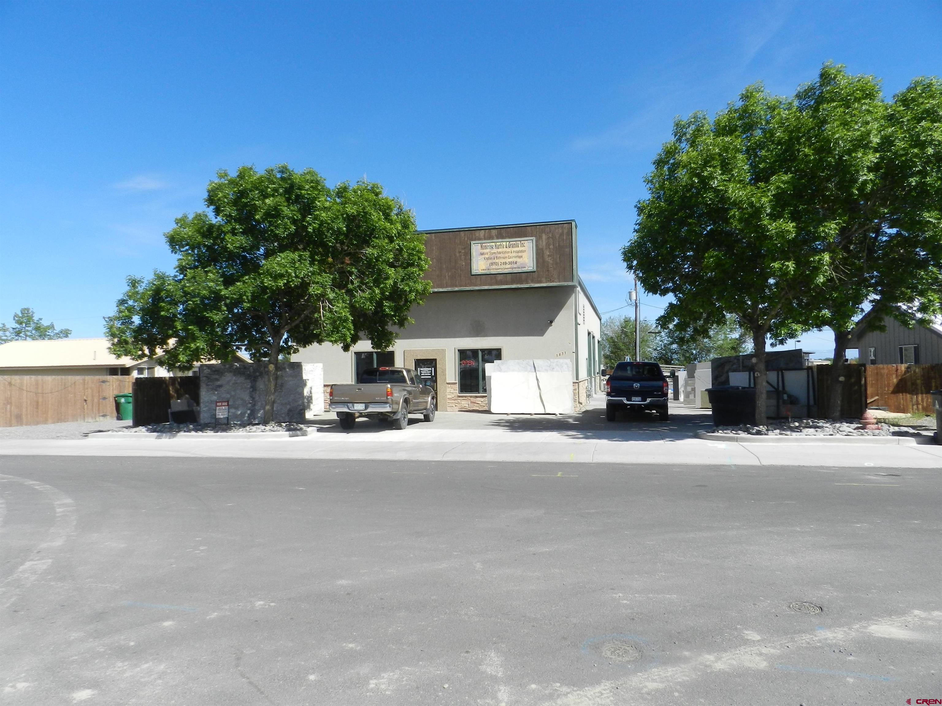 front view of a house with a street