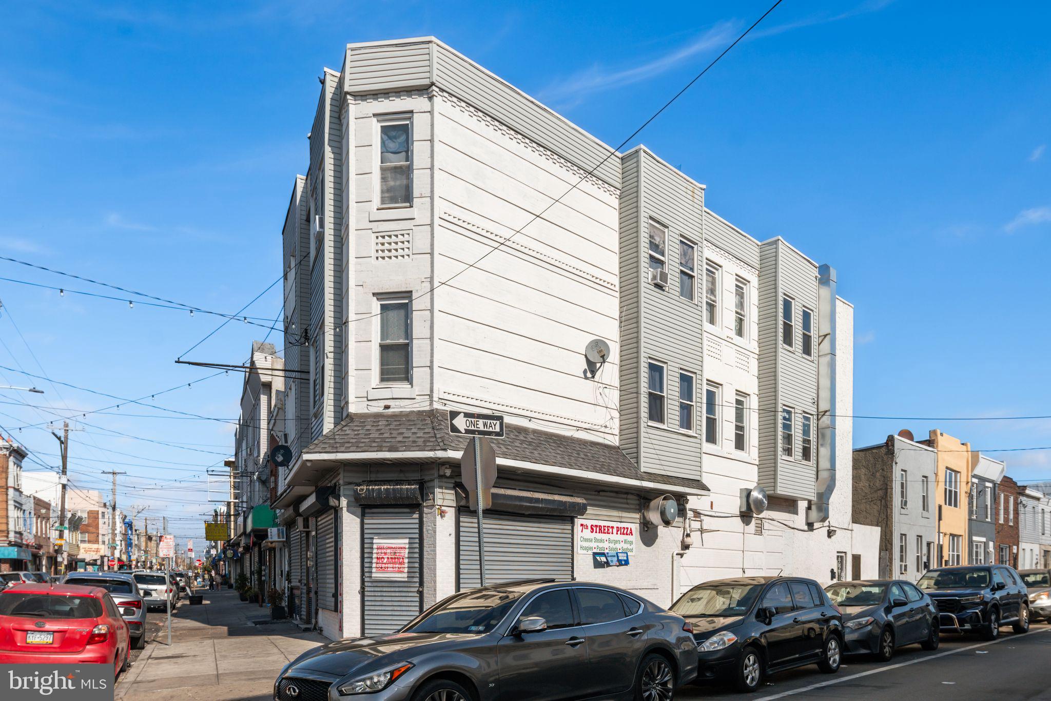 a front view of a building with street