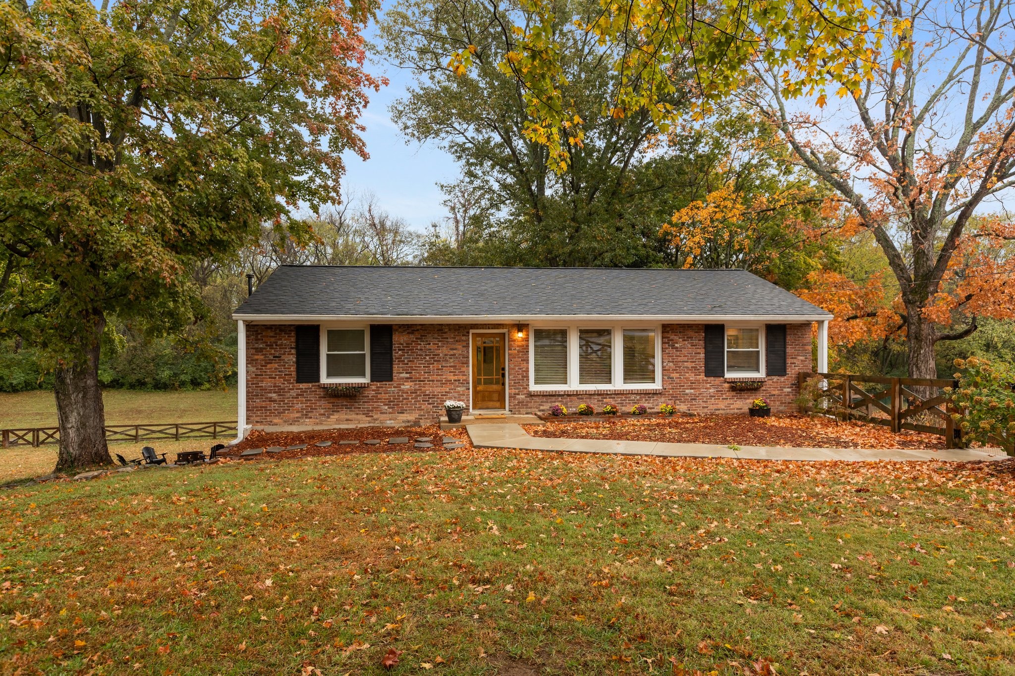 front view of a house with a yard