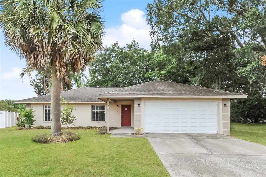 front view of a house with a yard