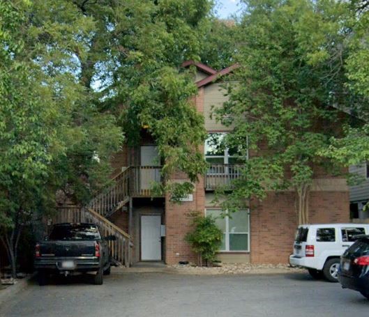 a car parked in front of a house