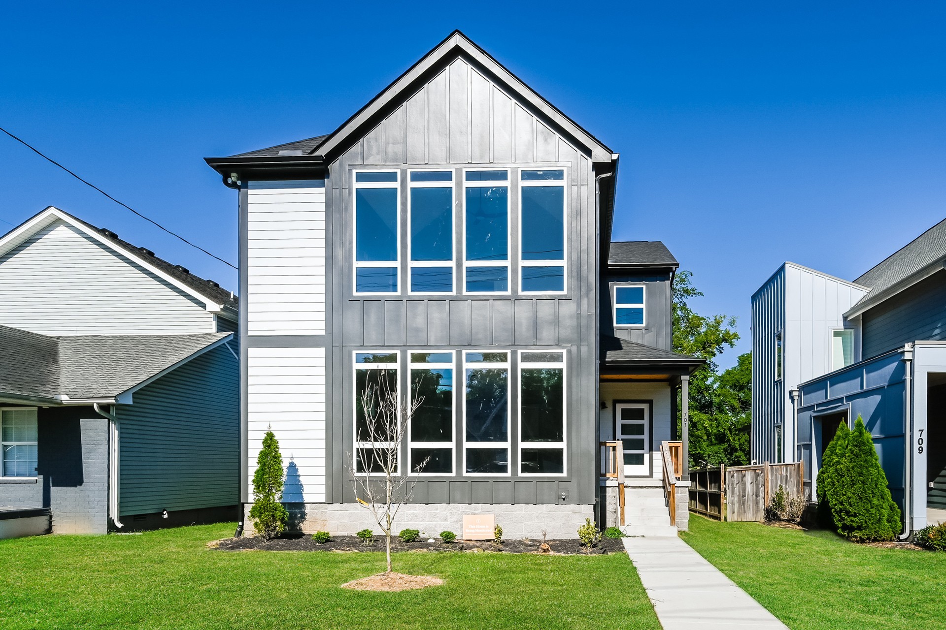 a view of front a house with a yard