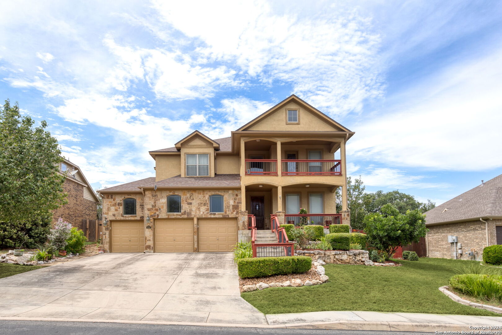 front view of a house with a yard