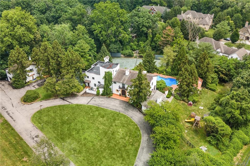 an aerial view of residential house with outdoor space