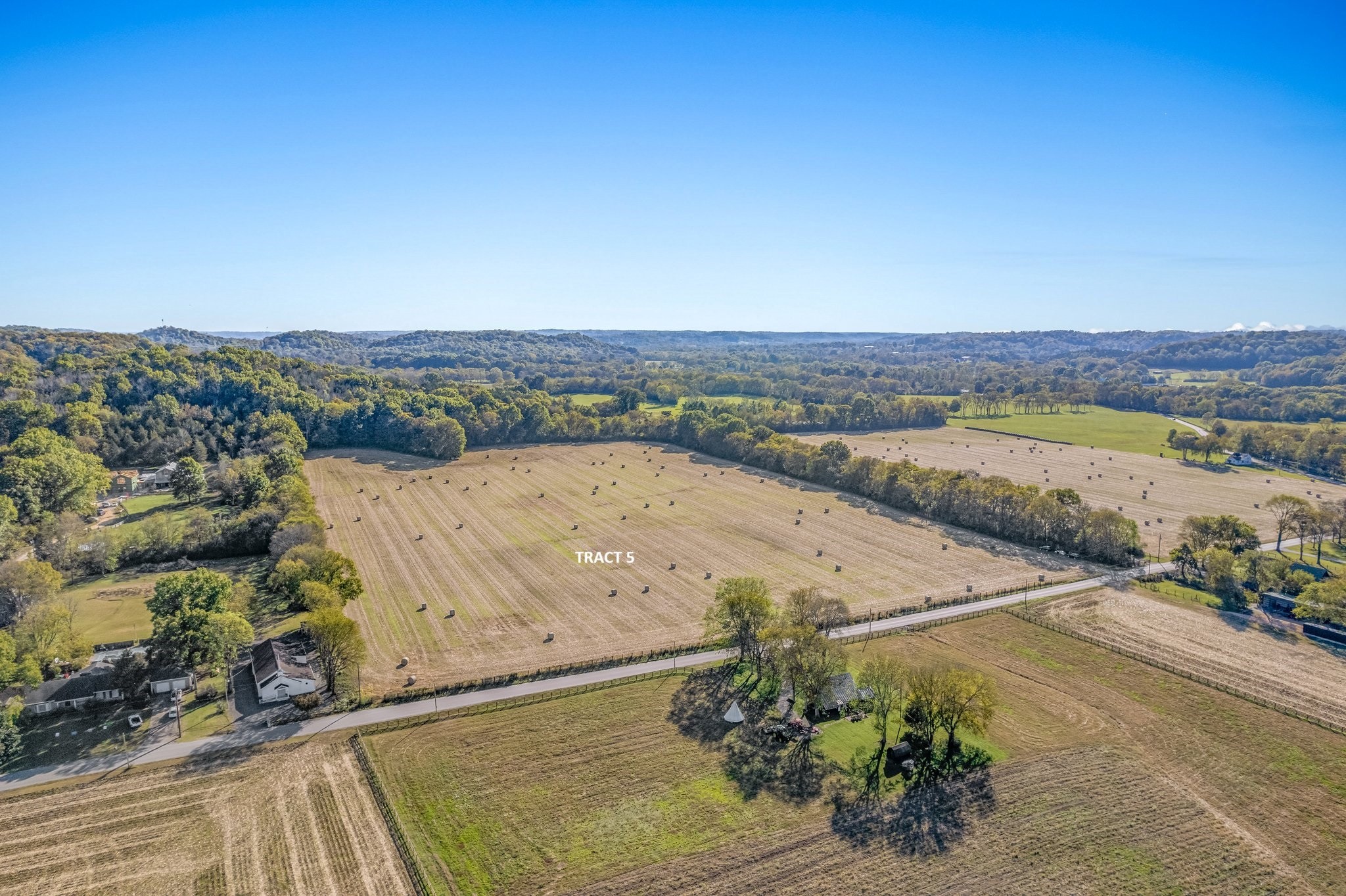 an aerial view of residential house and outdoor space