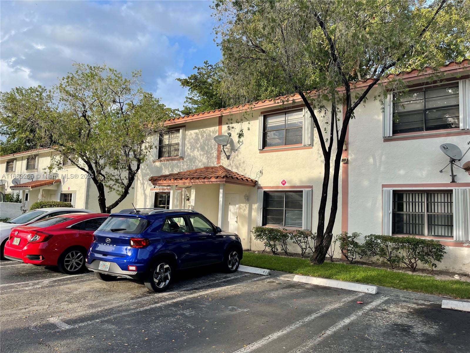 a car parked in front of a house