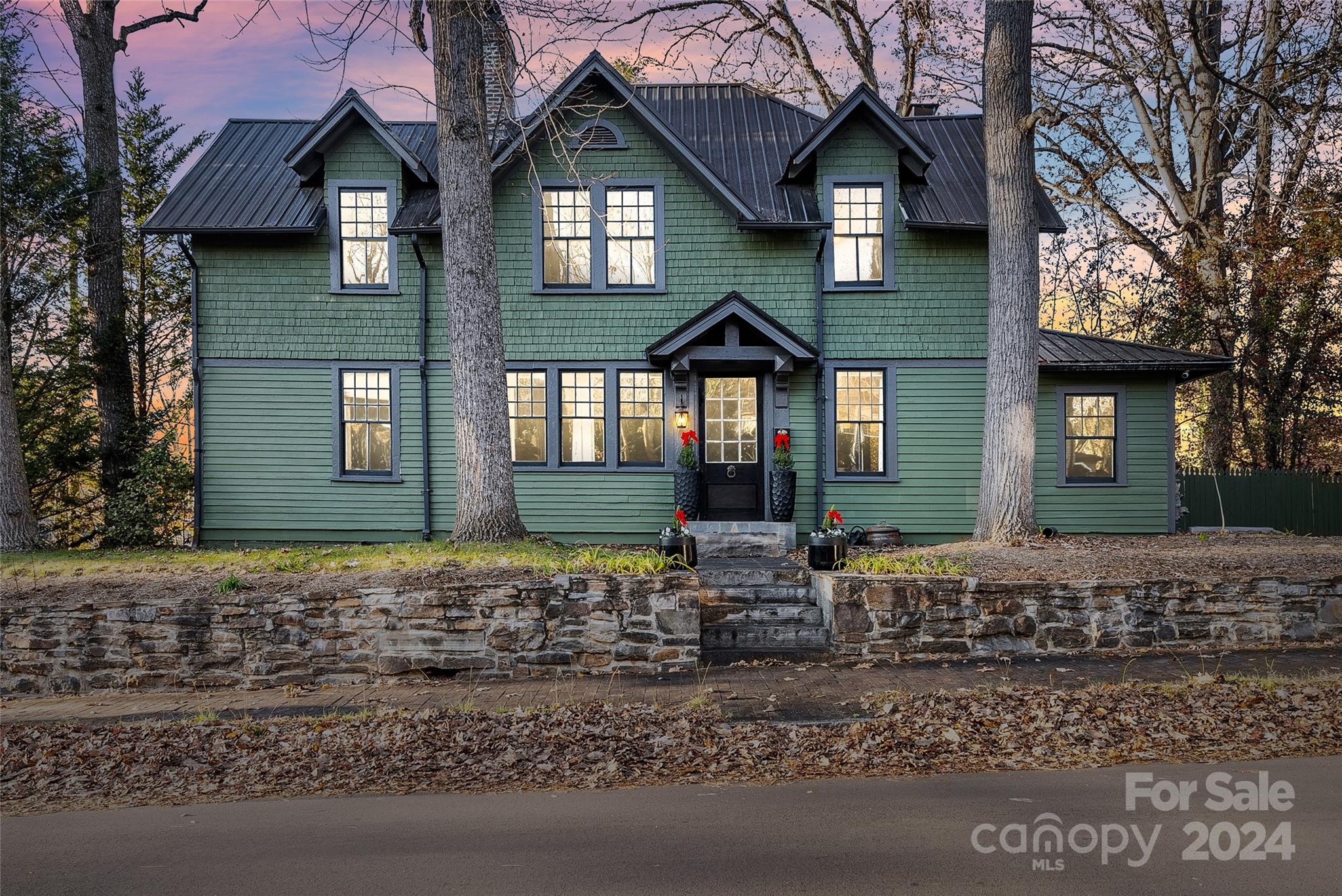 a front view of a house with yard